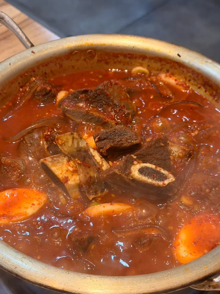 Beef galbijjim with glass noodles and rice cake sticks