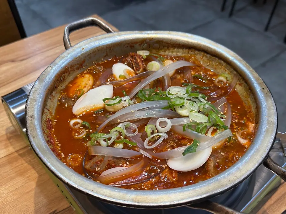Pot of spicy galbijjim with rice cake mixed in