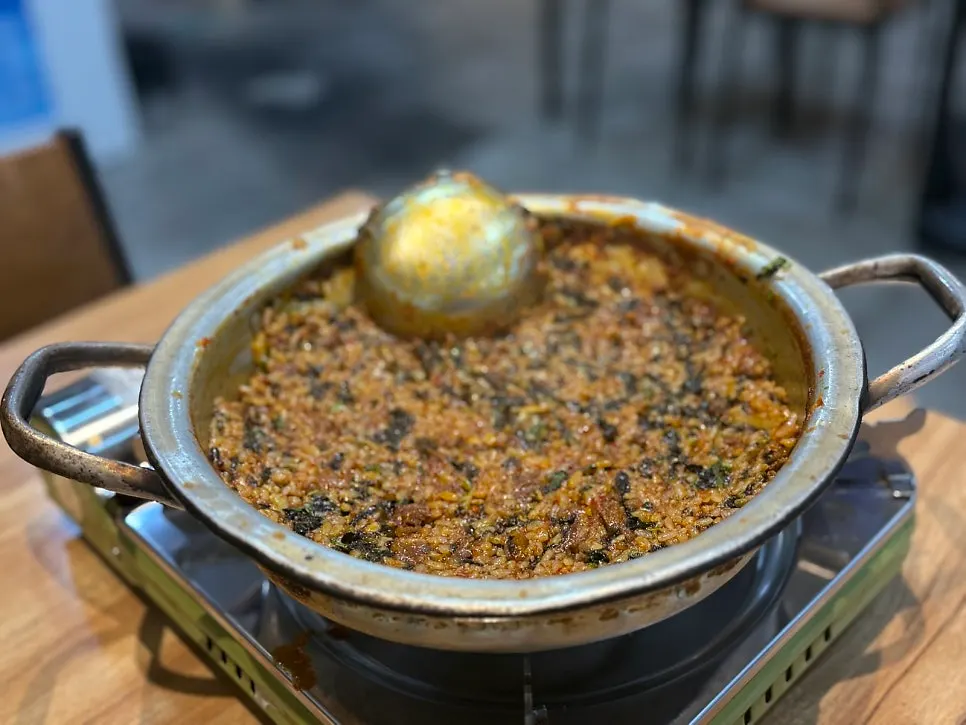 Fried rice spread flat and pressed down to crisp