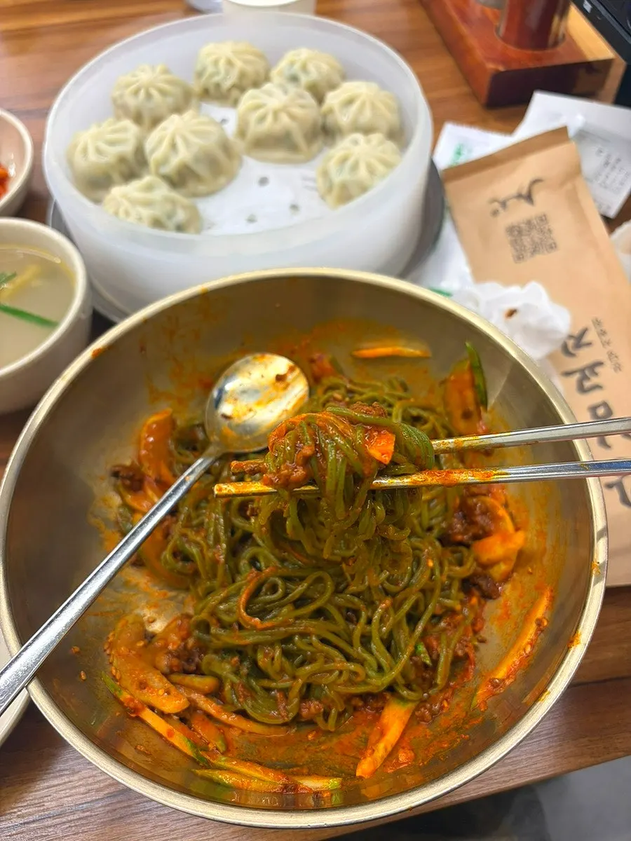 Gangnam Gyoja's bibim guksu topped with cucumber strips