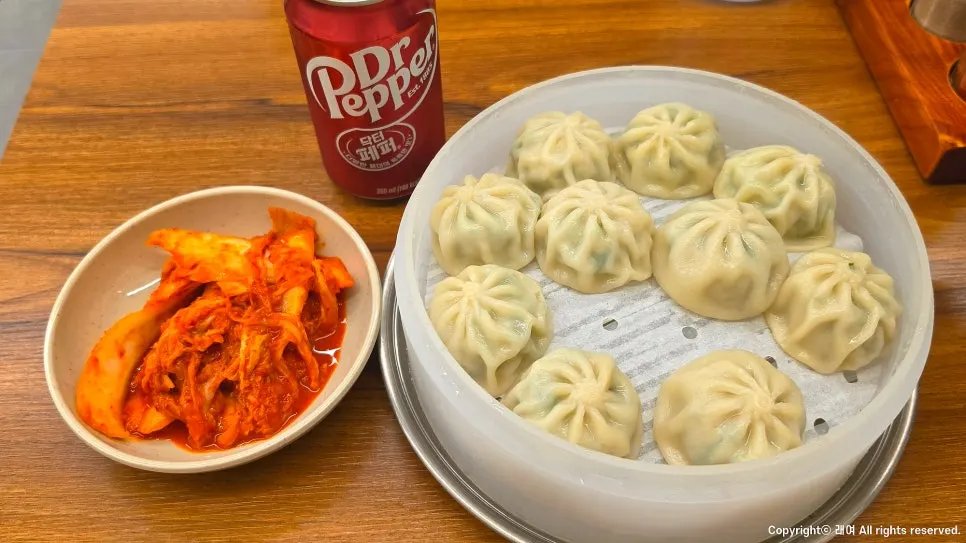 A plate of freshly served hot gyoza dumplings