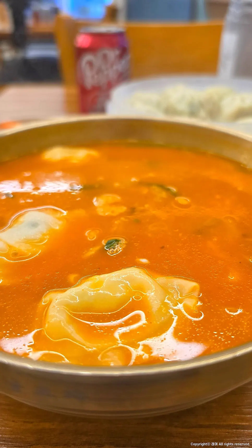 A lunch of sujebi and dumplings eaten together