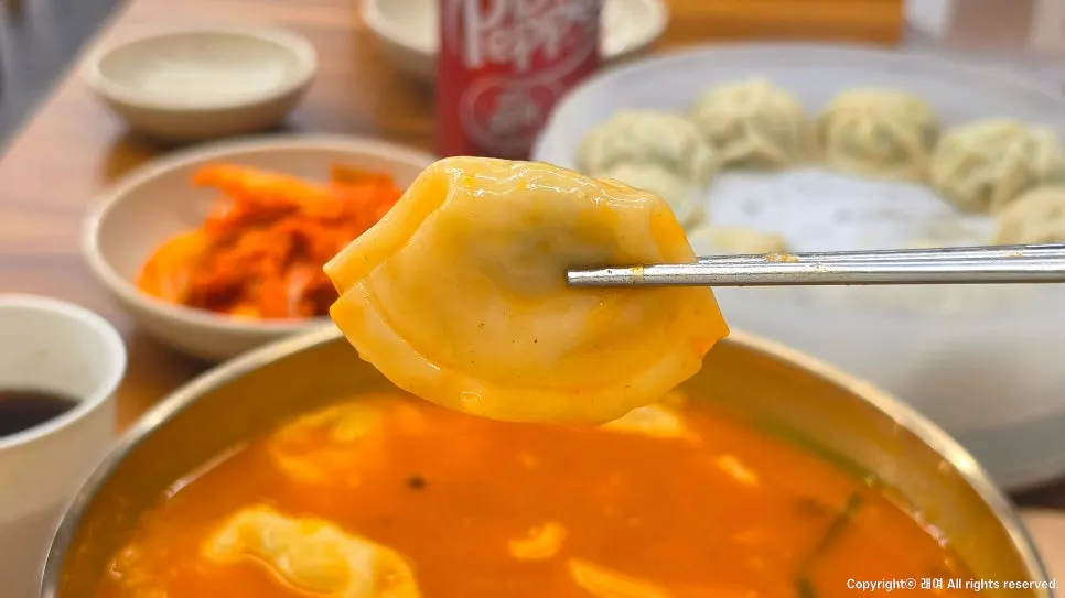 Broth from the spicy sujebi at Gangnam Gyoja Bundang Seohyeon Branch