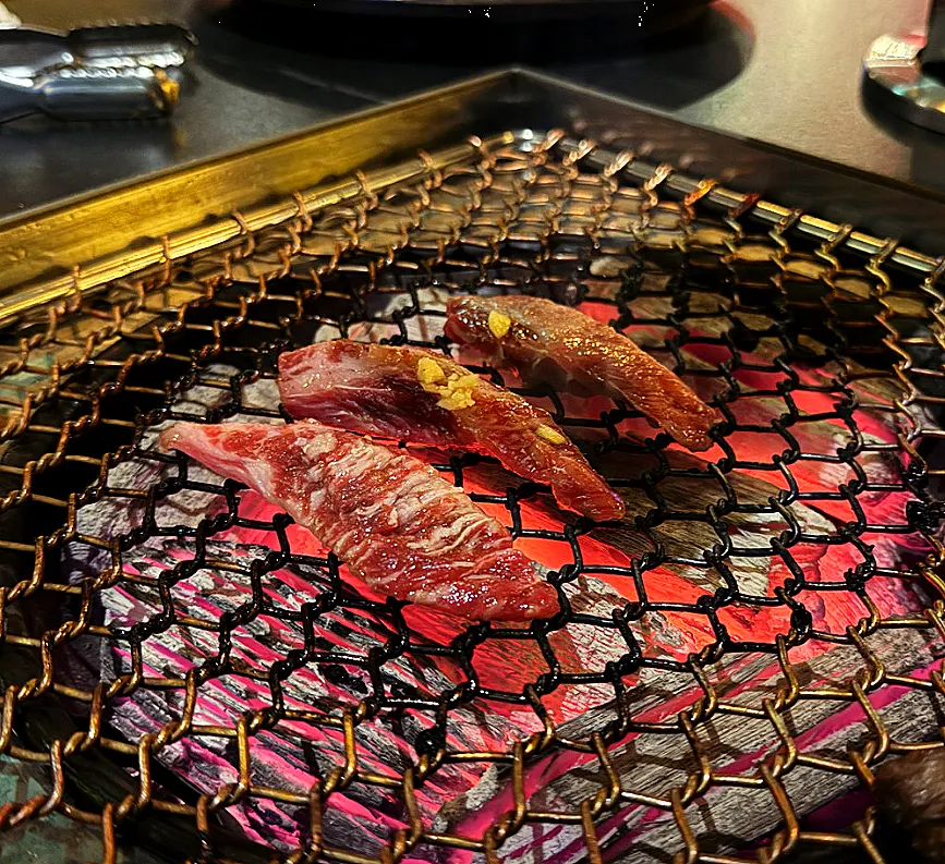 Seasoned short rib being grilled