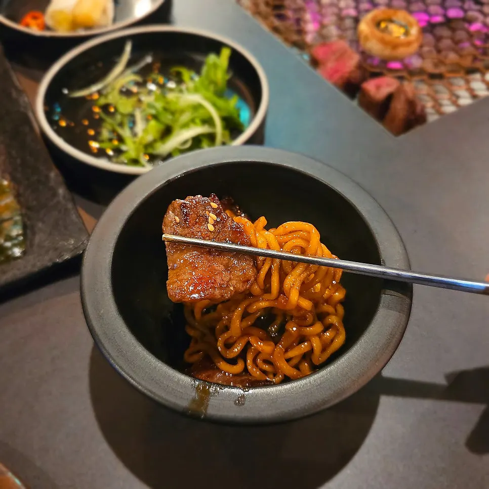 Jjapaguri and steamed egg served side by side