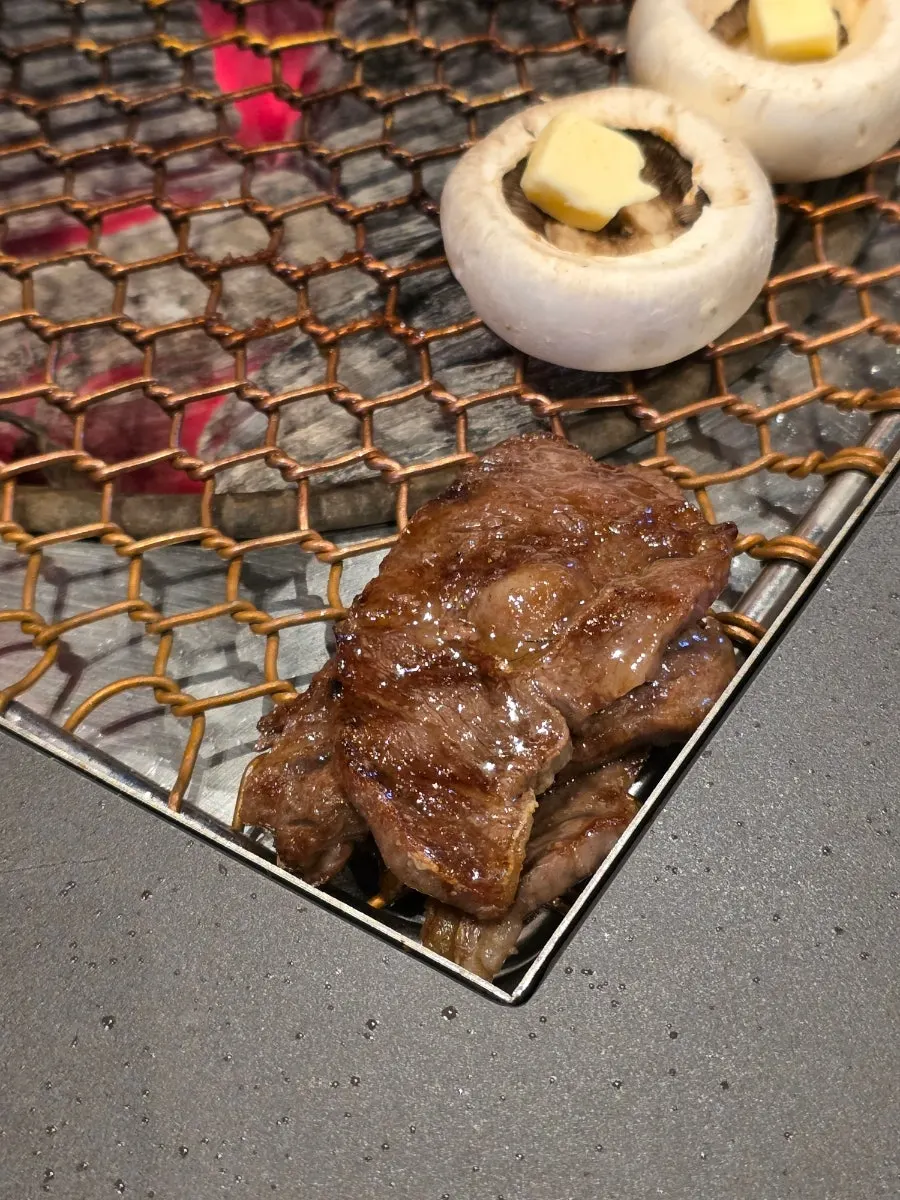 Beef grilled over charcoal