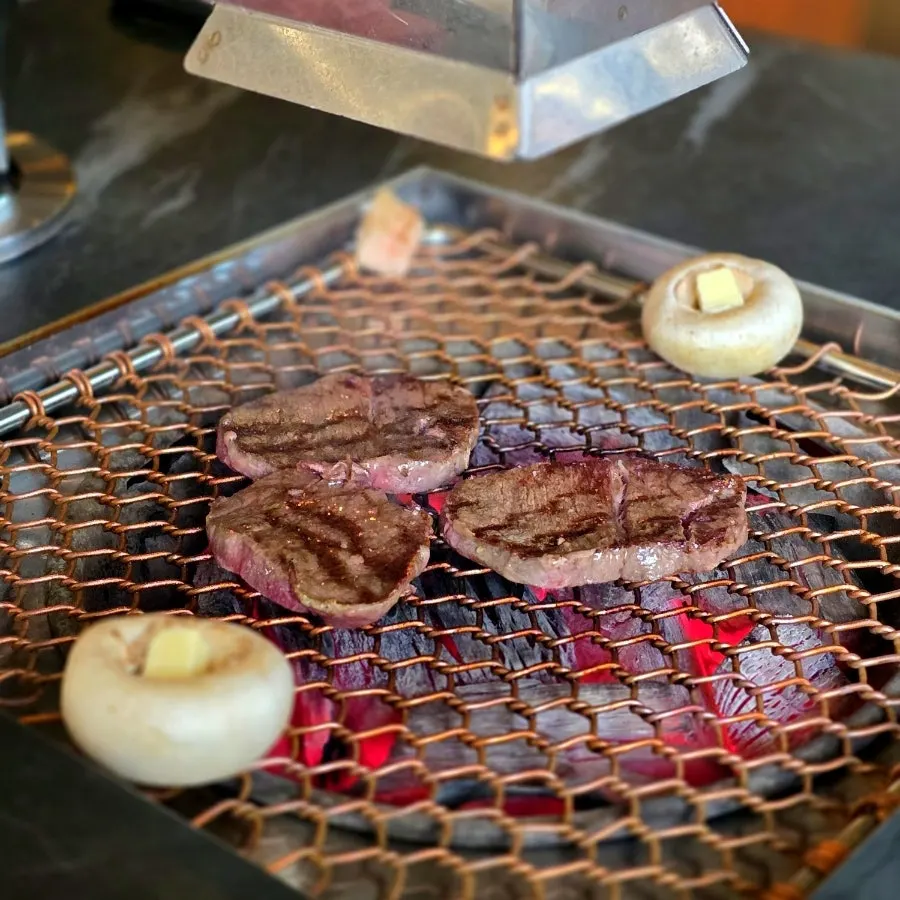 Seonghwa sirloin cooking over charcoal