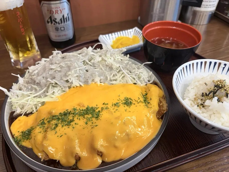 Tonkatsu topped with cheddar cheese sauce