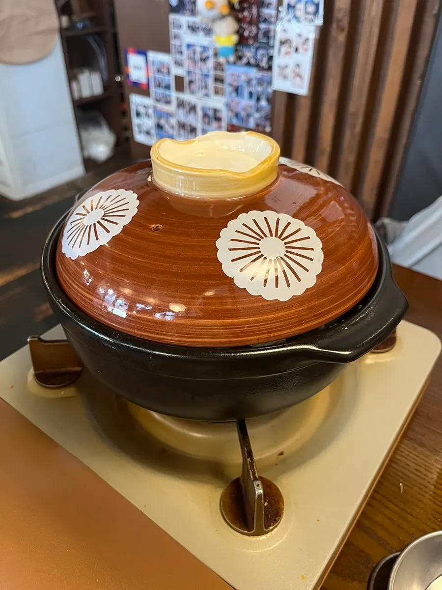 Table setting for the Horanggul gopchang hot pot for two