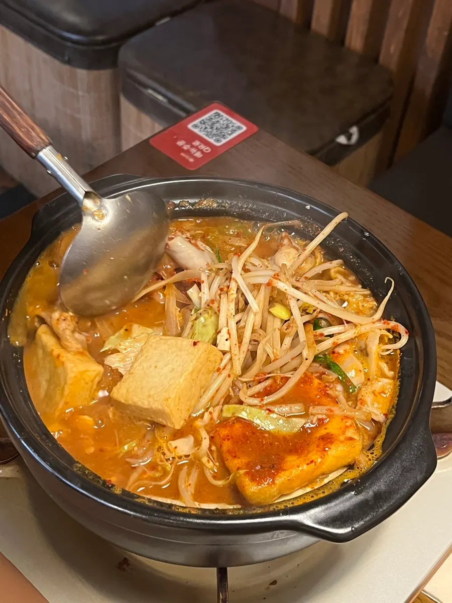 A piece of thoroughly cooked Korean beef daechang