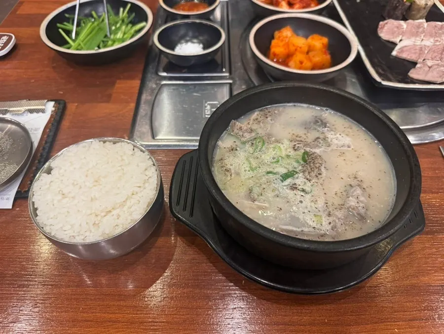 A table set with sundae gukbap and side dishes
