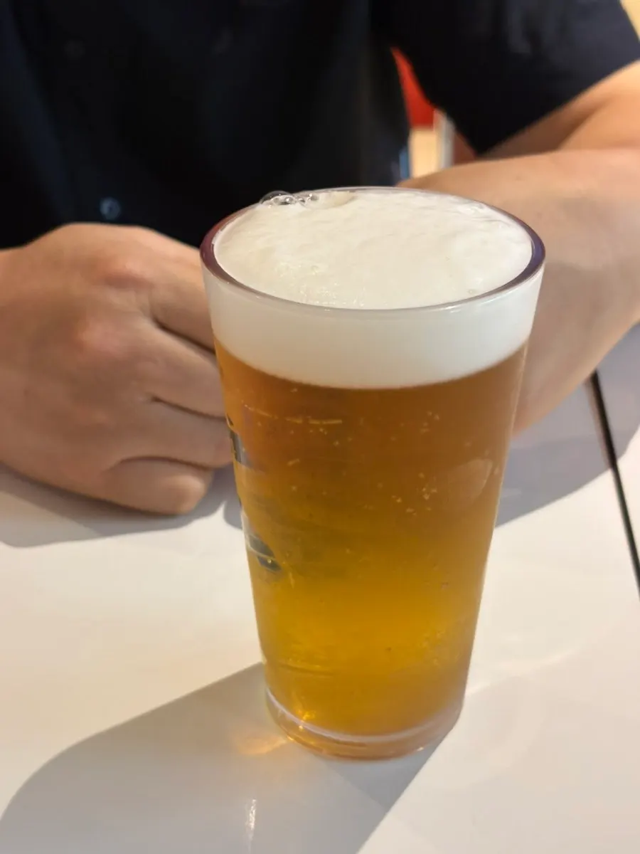 Draft beer ordered alongside the pizza