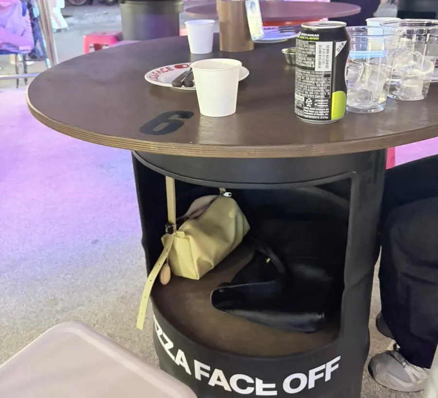 Bag storage space under the table
