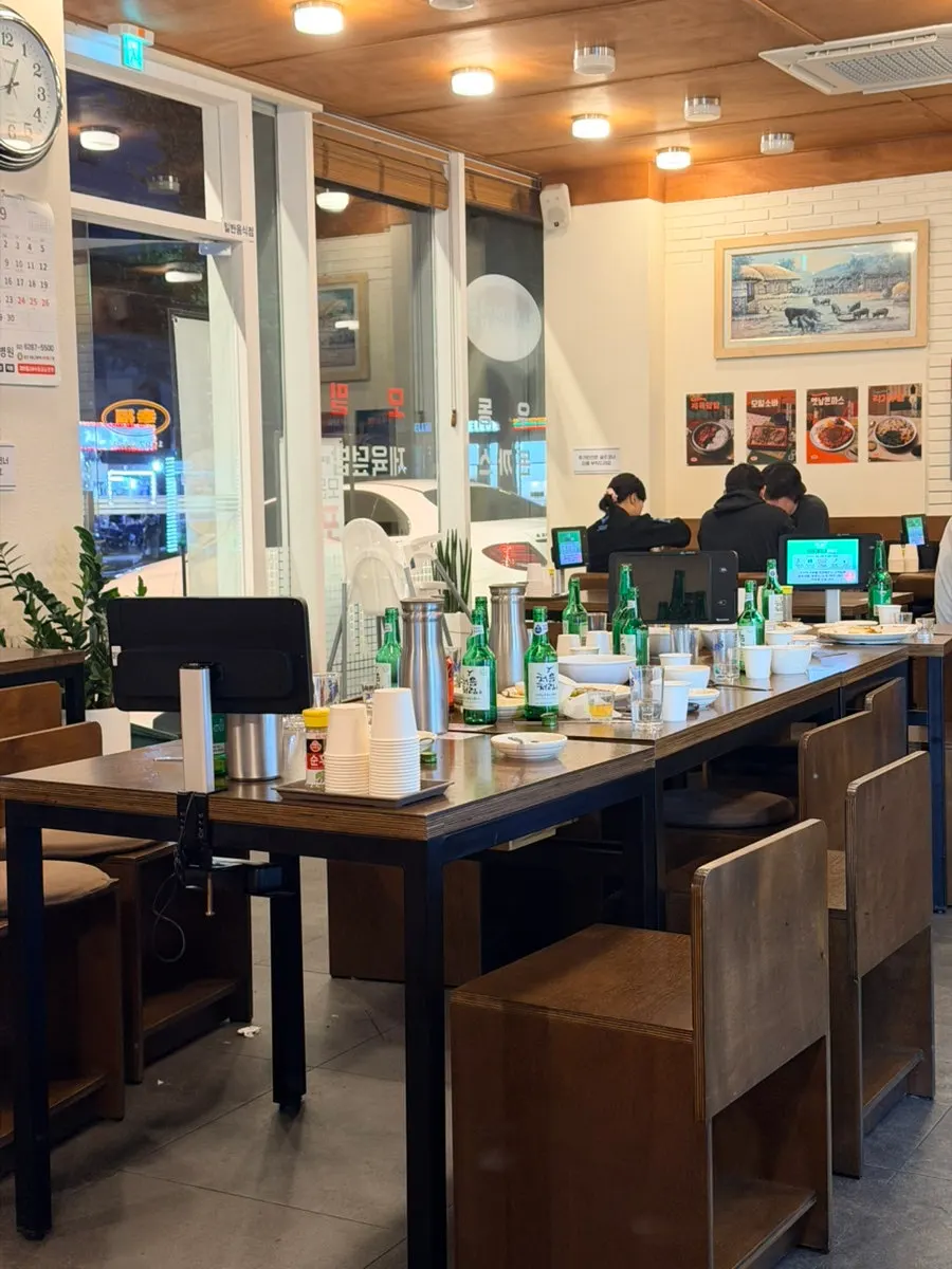 Neatly arranged seating inside the udon restaurant