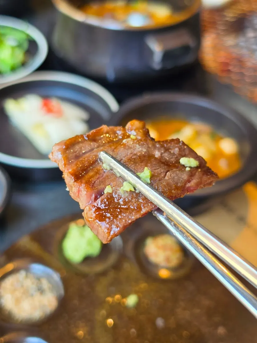 Seonghwa sirloin grilling over charcoal
