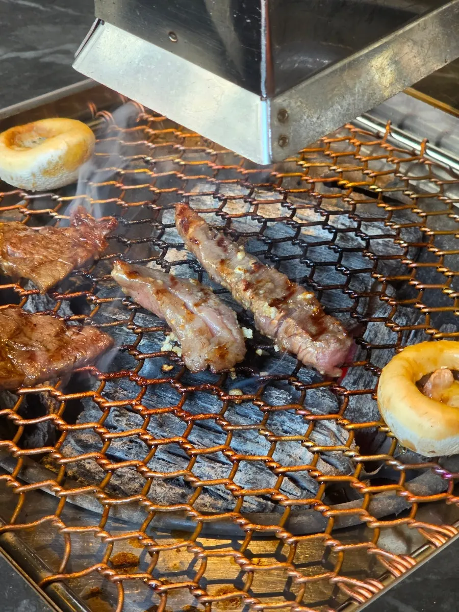 Beef wrapped with side dishes