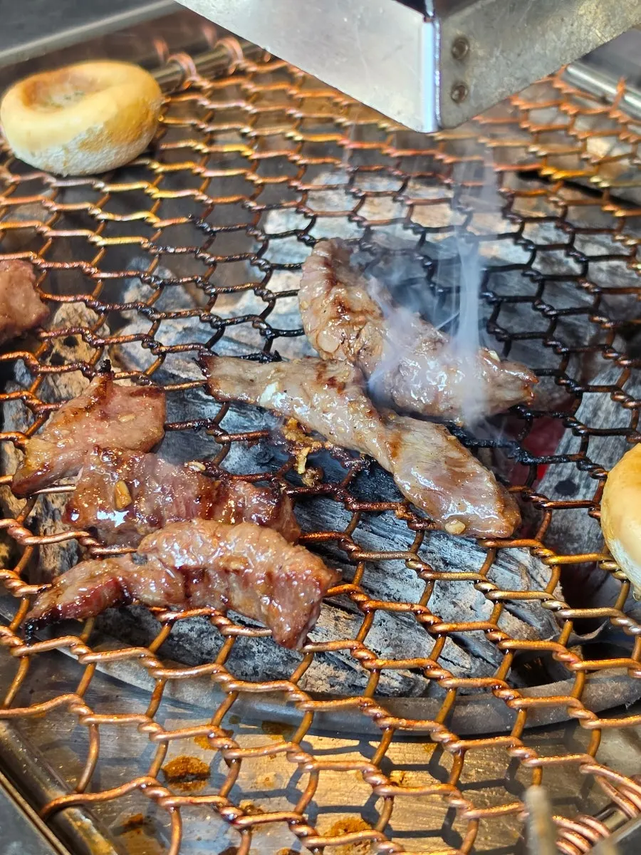 Wine-marinated rib meat grilled at the table