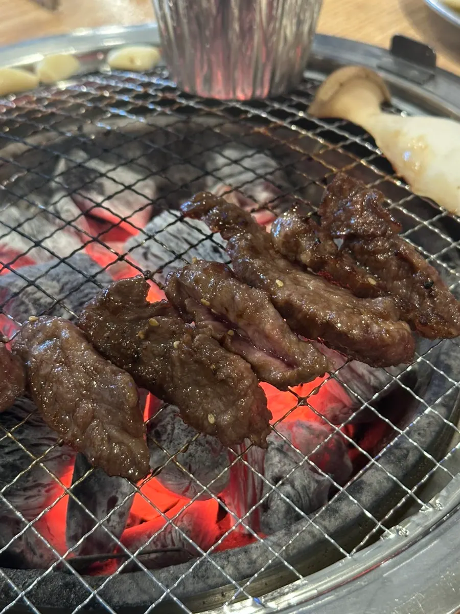 Marinated beef galbisal grilling over charcoal