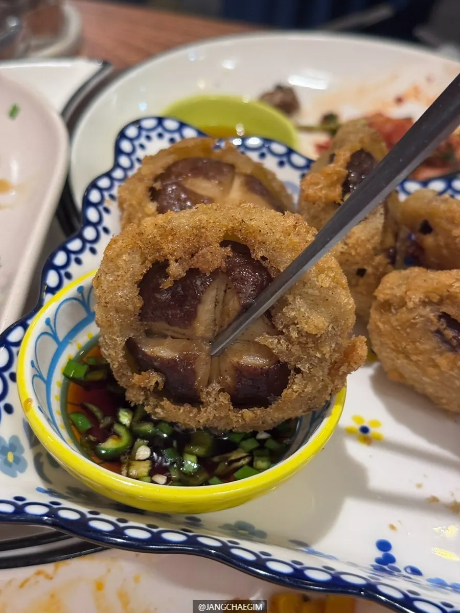 Close-up of the crispy shiitake squid fritters