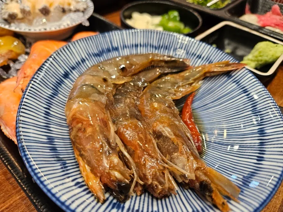 Soy-marinated shrimp and seafood skedashi