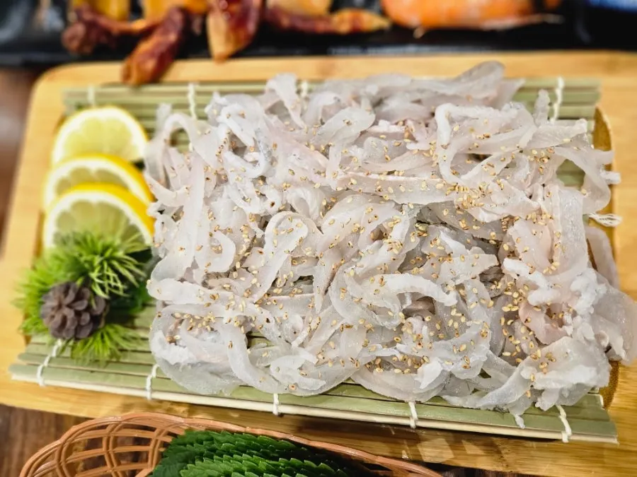 Side dishes served with flatfish sashimi