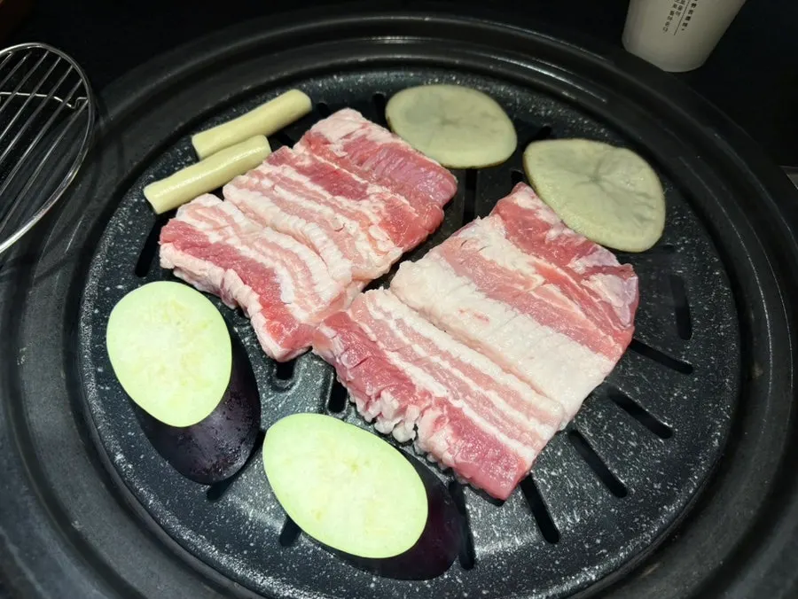 Raw ribs and side dishes set on the table