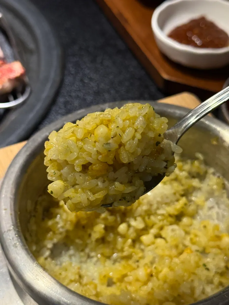A bowl of hot pot rice full of corn kernels