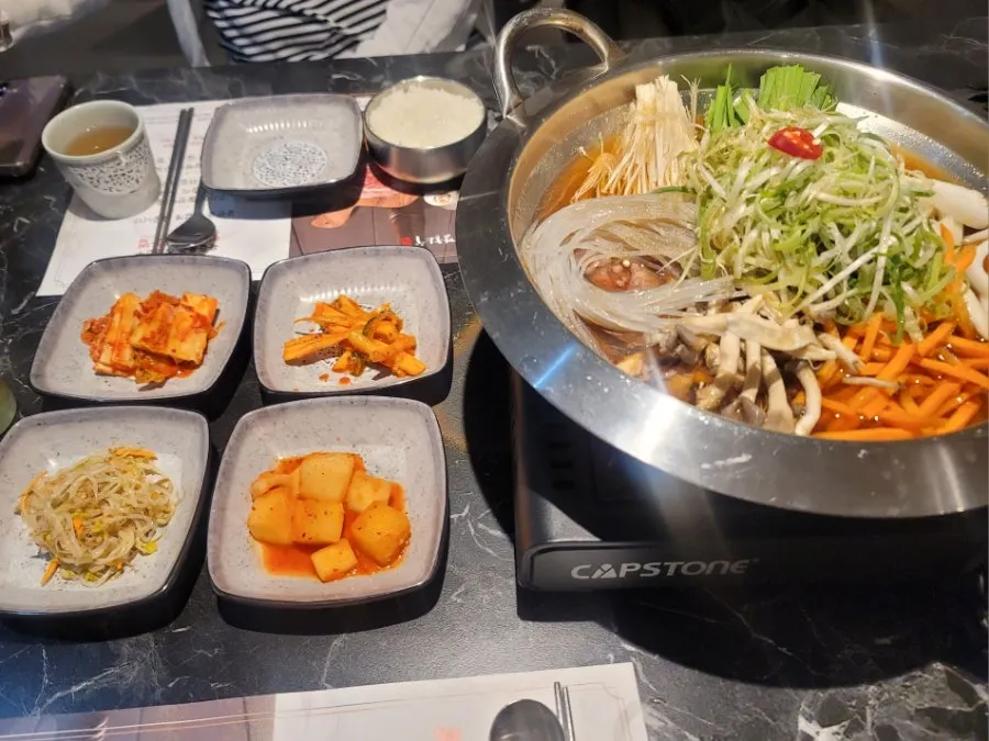 Full spread with the female hanwoo bulgogi hotpot