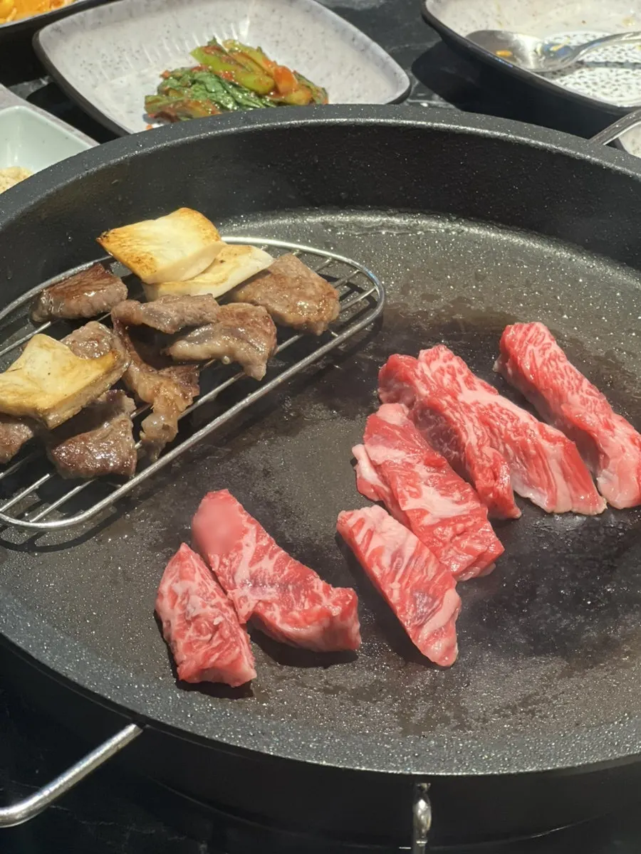 Tidy banchan served alongside hanwoo beef