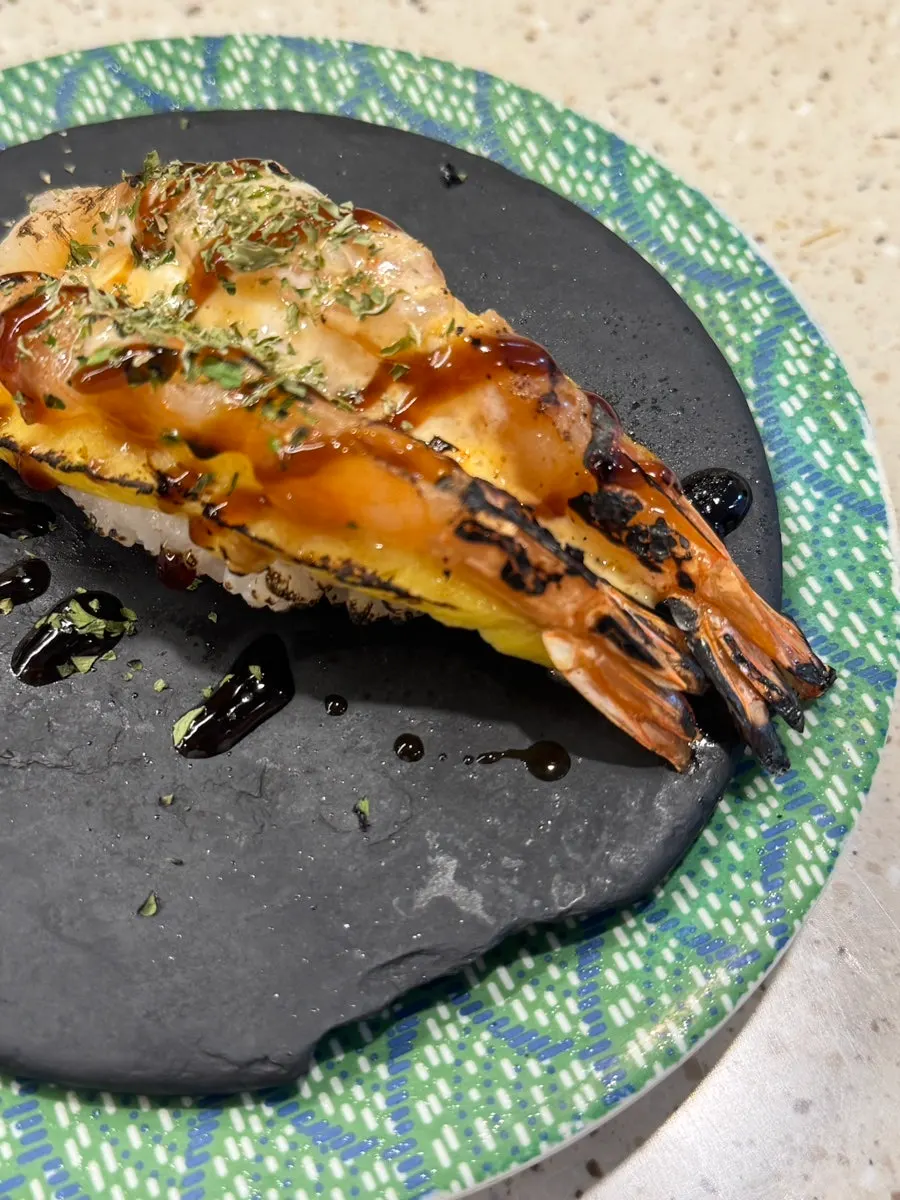 Torch-grilled egg shrimp sushi