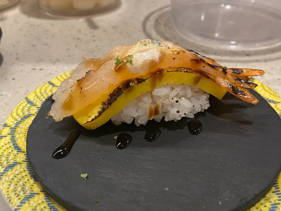 Close-up of shrimp on egg sushi