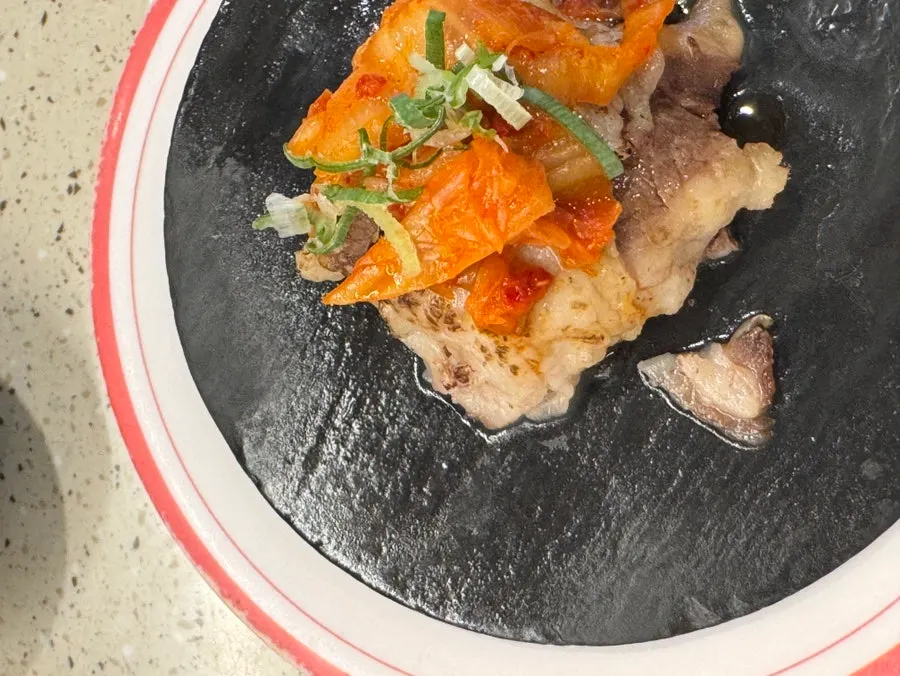 Pork belly bossam sushi topped with bossam kimchi