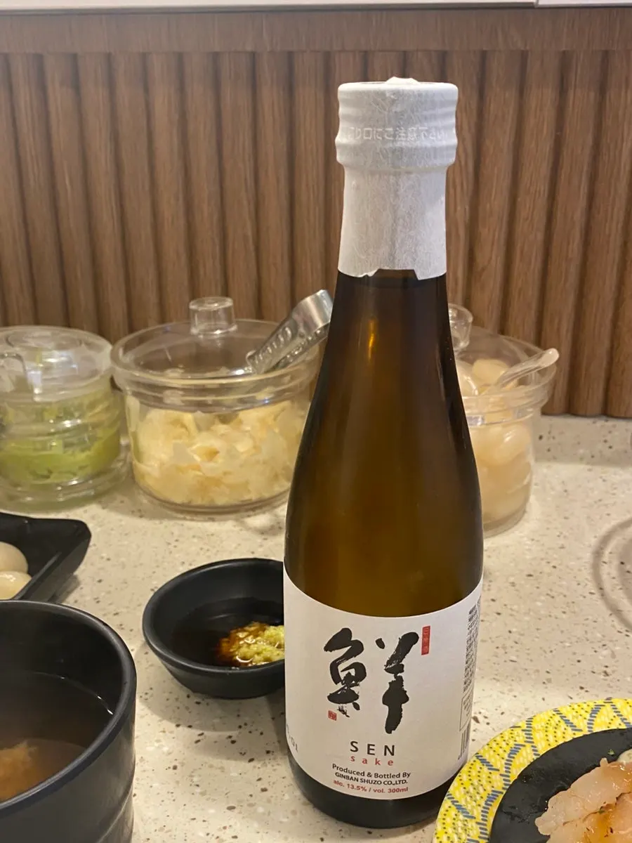 A bottle of sake ordered alongside the sushi