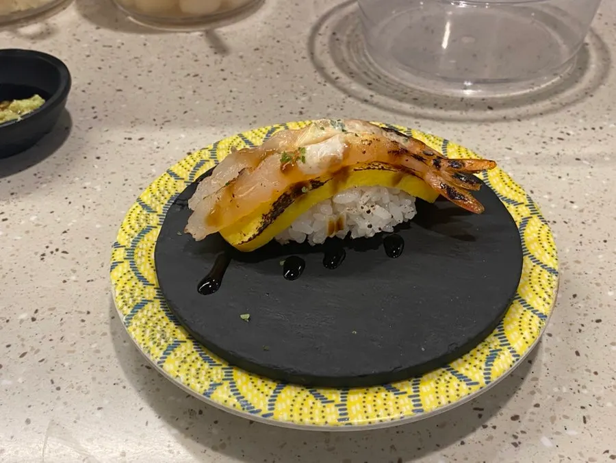 Stacked sushi plates at the end of the meal