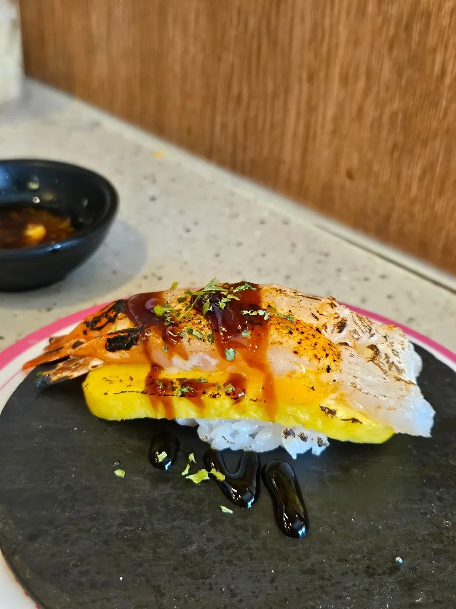 Akami (lean tuna) sushi bigger than the rice underneath