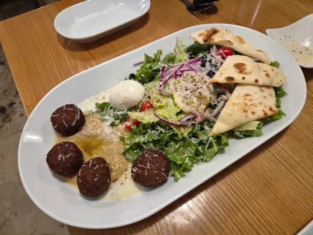 Hummus salad and naan