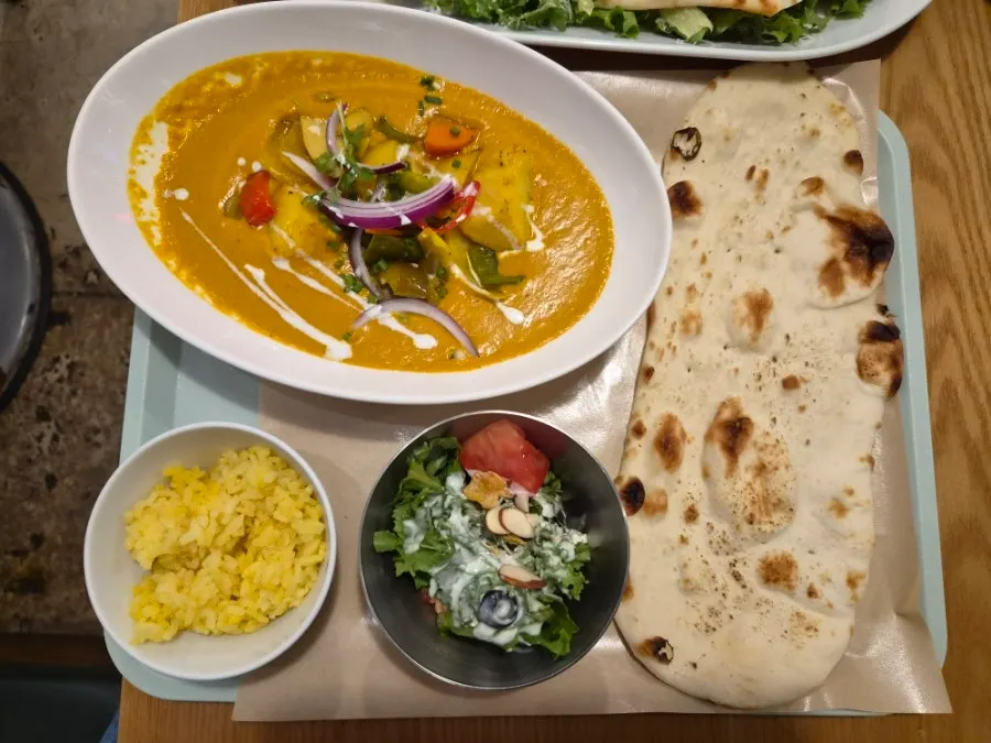 Fried chickpea fritters and hummus salad