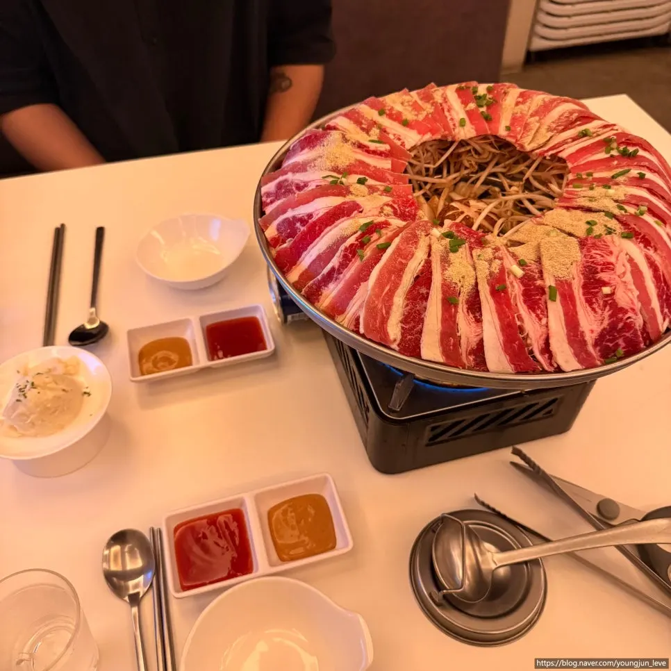 Dowon shabu piled high with meat and bean sprouts