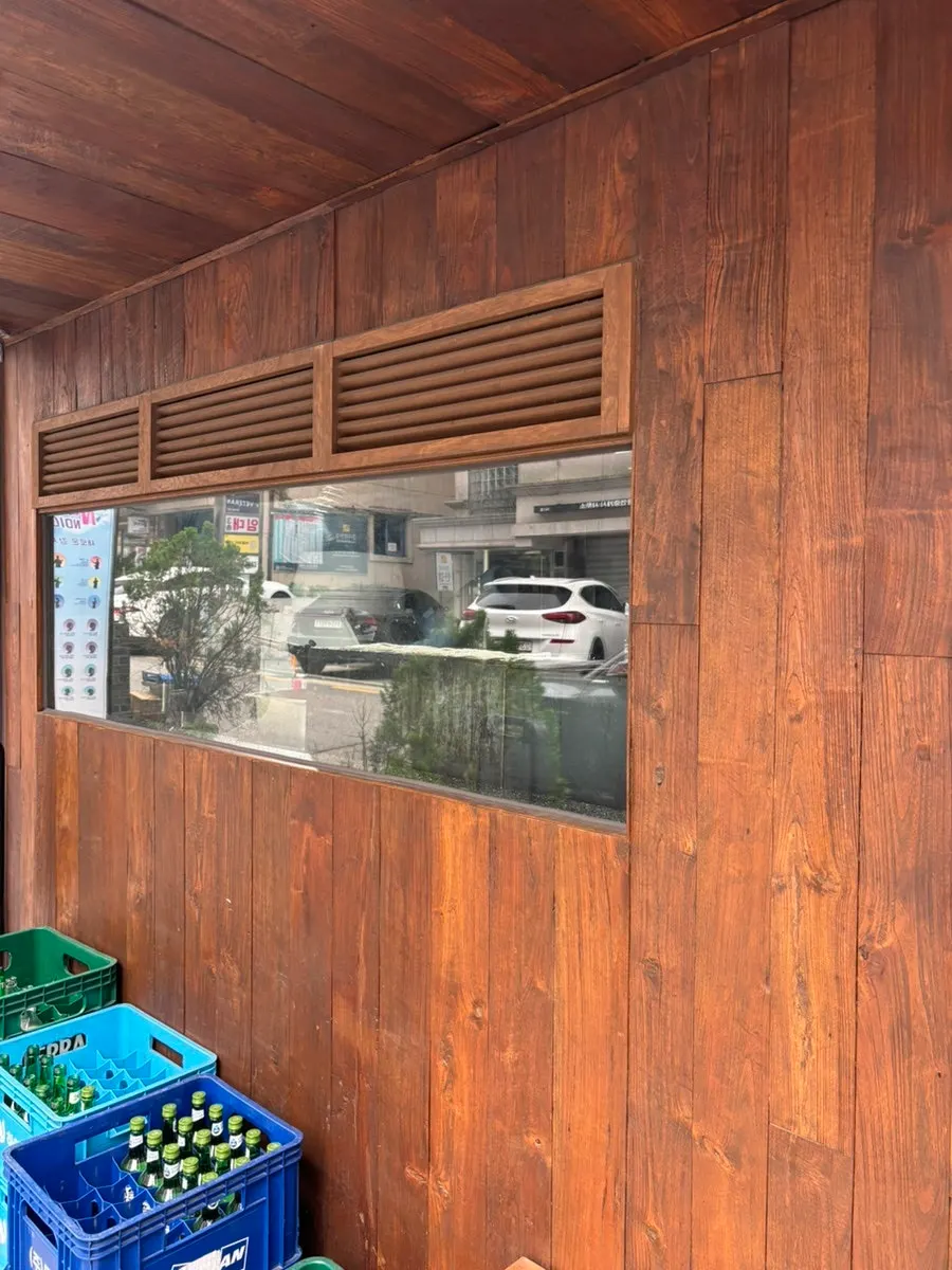 Eel being grilled at the restaurant entrance