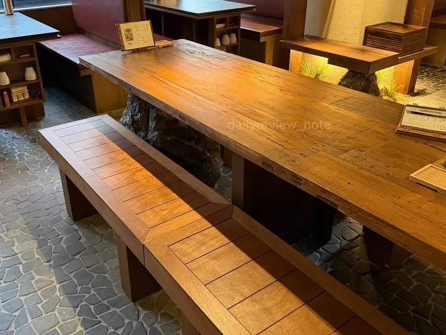 Wood-toned interior of Manmok