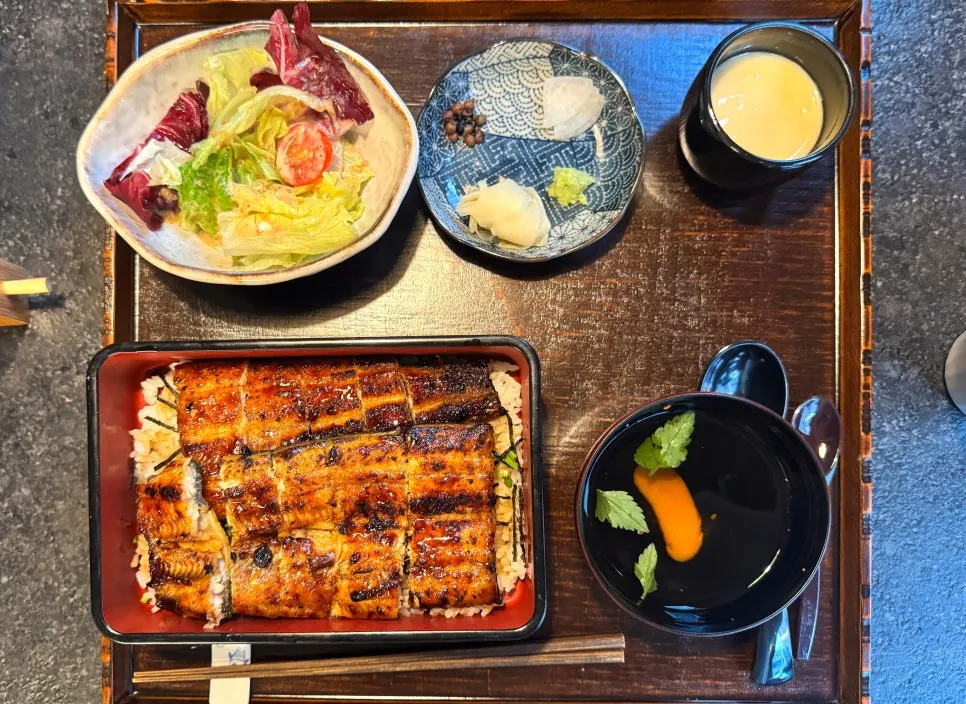 The full eel rice bowl spread with soup, salad, and chawanmushi