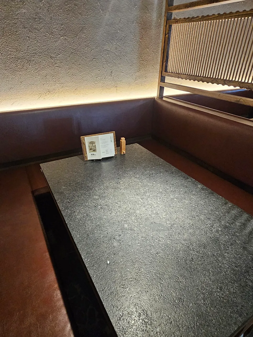 Manmok's dining hall seating with wide table spacing