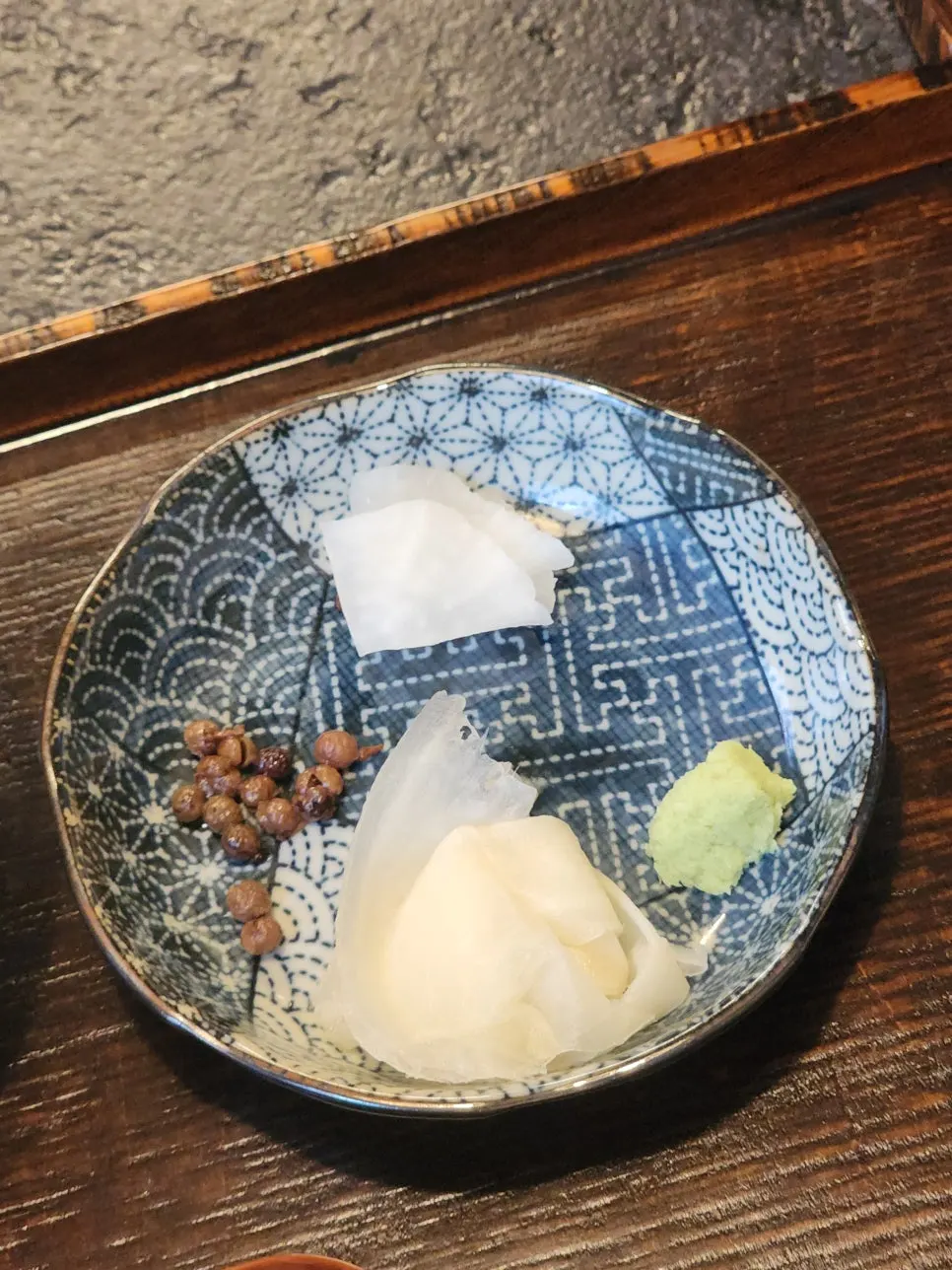 Wasabi, ginger, sancho pepper, and pickled side dishes