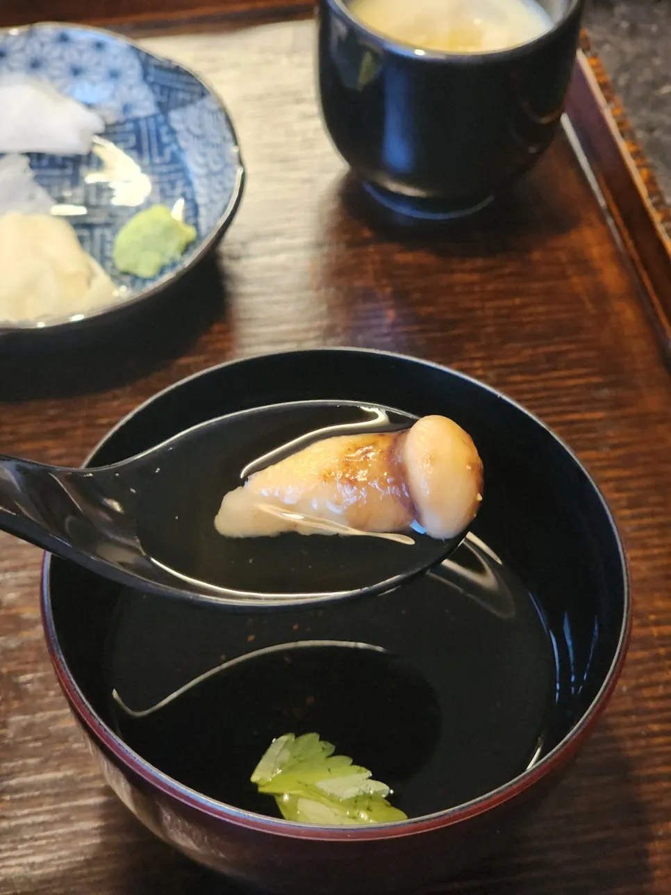 A bowl of clear matsutake mushroom soup