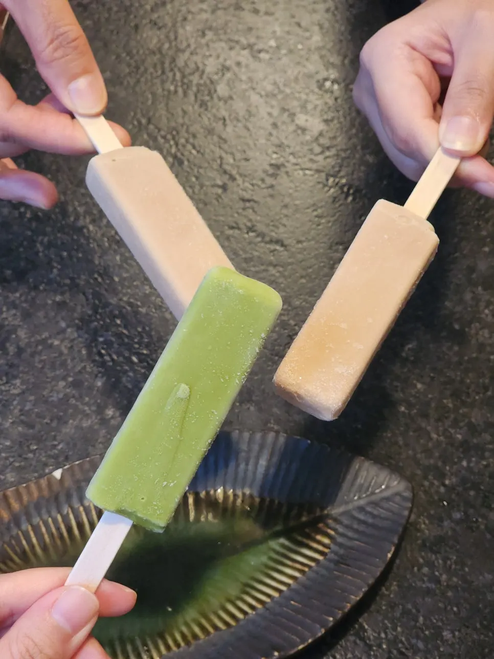 Two bar ice creams, matcha and black tea