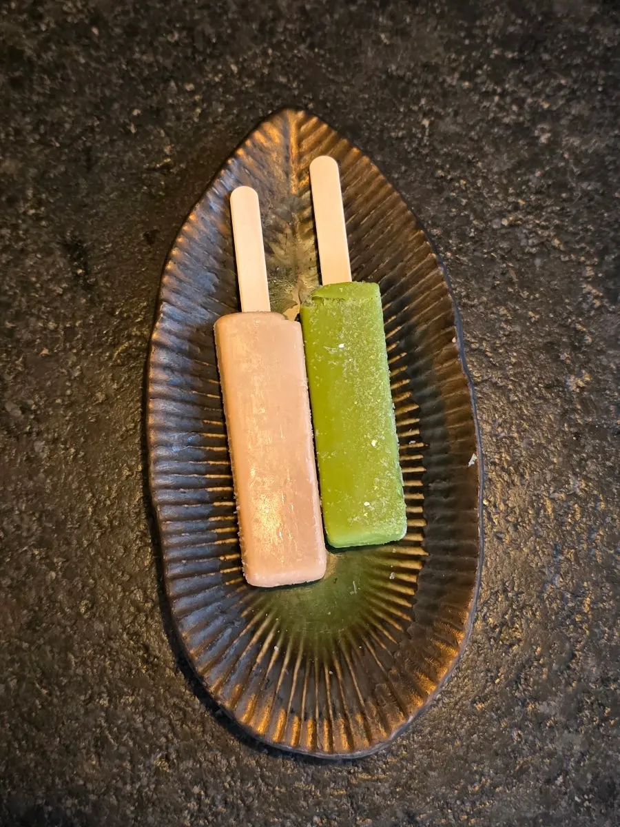 Matcha ice bar and black tea ice bar served in a long dish