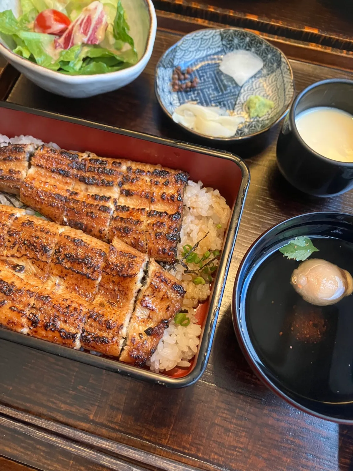 Container of sansho pepper powder for eel rice bowl on the table