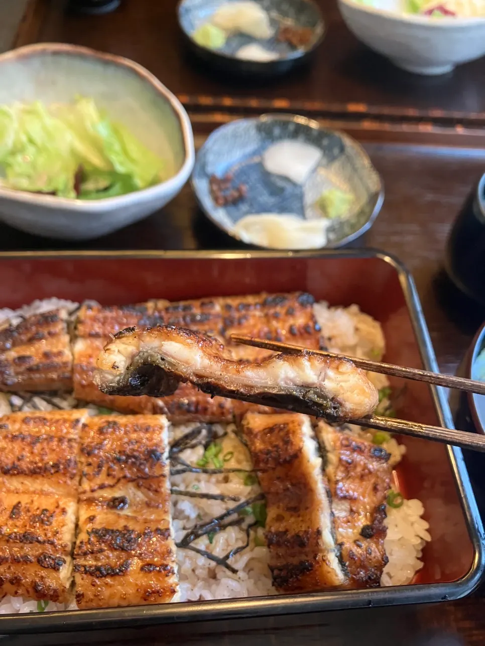 Eel topped with wasabi and pickled sansho