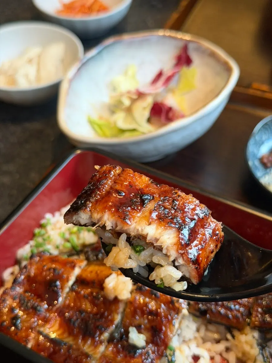 Eel topped with fresh wasabi and turnip pickle