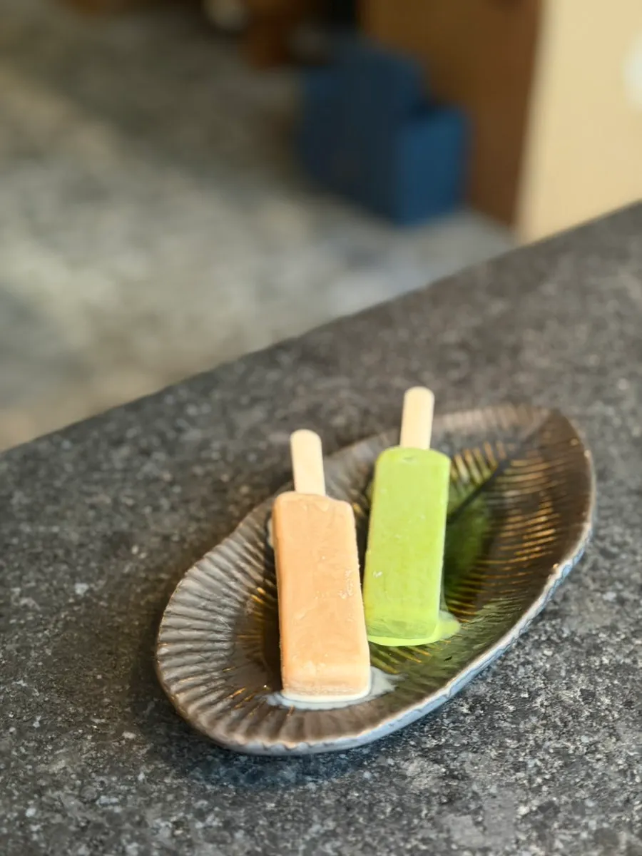 Black tea and matcha flavored ice cream served for dessert